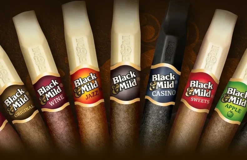 Row of Black & Mild cigars with flavor bands (Cherry, Original, Wine, Jazz, Mild, Casino, Sweets, Apple, Vanilla).