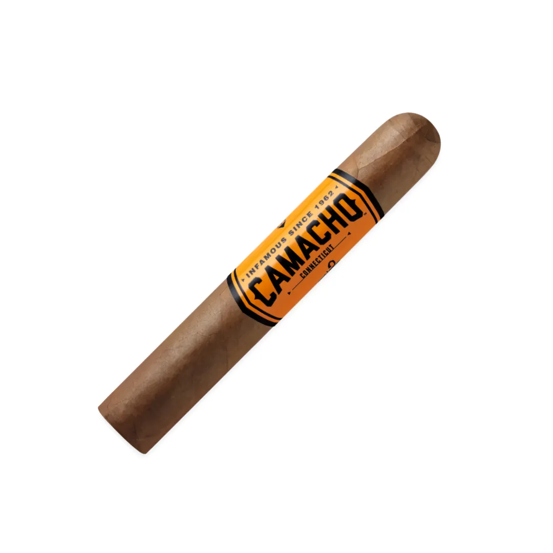 Brown cigar with an orange Camacho band, angled diagonally across a white background.