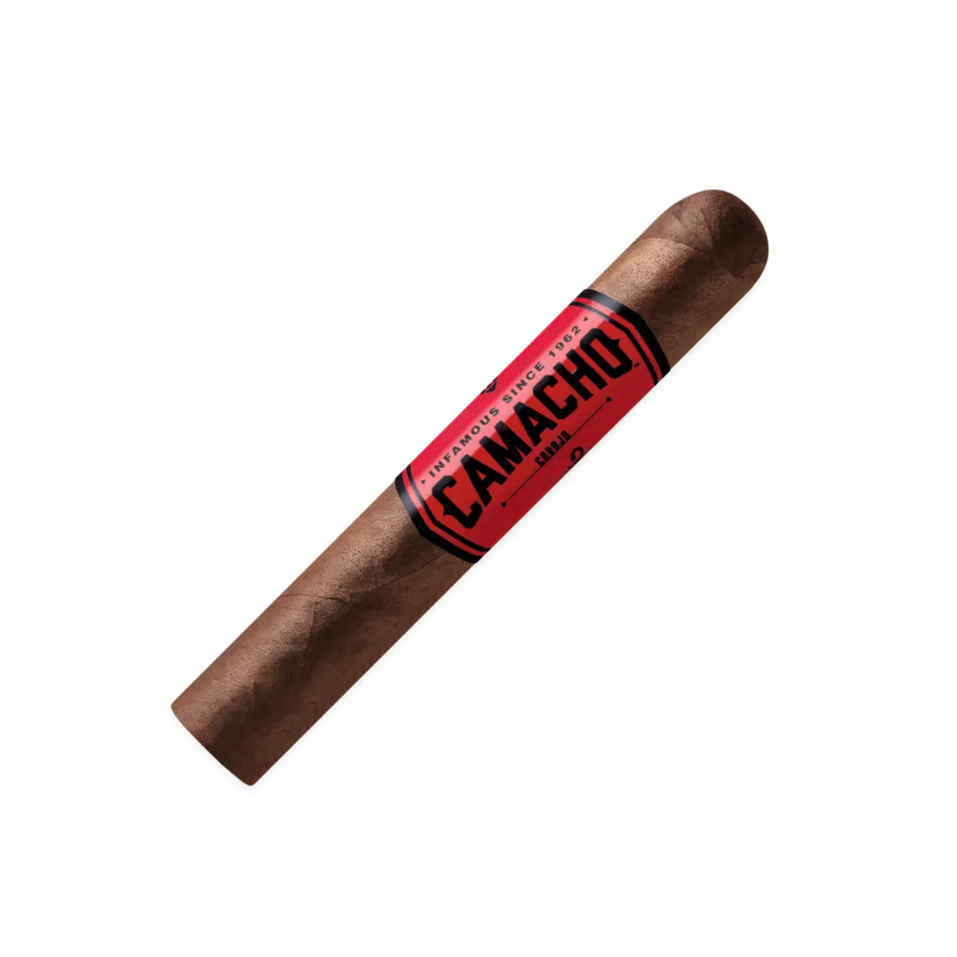 Cigar with a red Camacho label and brown wrapper, angled diagonally across a white background