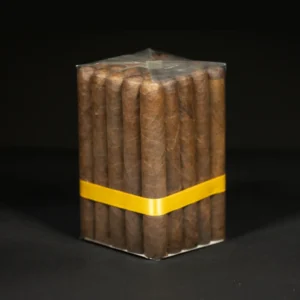 Bundle of brown cigars wrapped in clear plastic with a yellow ribbon against a dark background, standing upright.